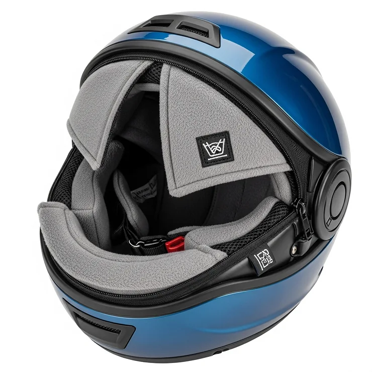 Interior shot of a blue motorcycle helmet revealing its plush, removable, and washable padding designed for maximum comfort and hygiene.