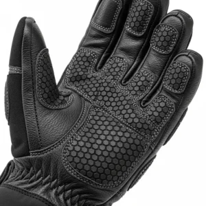 Close-up of the palm of a winter motorcycle glove, showcasing the anti-slip material and reinforced leather for enhanced grip and durability on the handlebars.