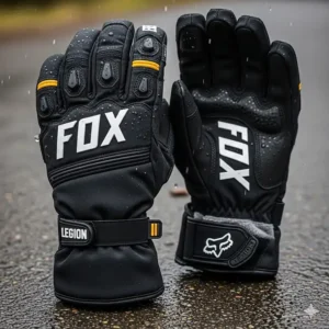 A pair of Fox Legion motorcycle gloves, emphasizing their water-resistant material and insulated lining for all-weather riding.