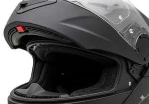 Close-up view of the modular motorcycle helmet with the chin bar fully raised, showing the ease of transitioning into an open-face style.
