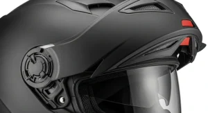 Focus on the adjustable vents and air intakes on the front and top of the modular helmet, illustrating the optimized airflow and ventilation.