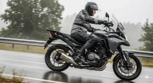 A motorcyclist wearing waterproof boots riding in the rain, demonstrating how the gear performs in wet and challenging weather conditions.
