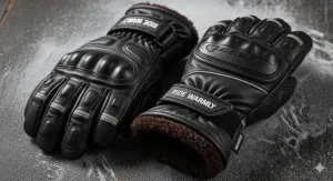 A pair of insulated winter leather motorcycle gloves with a warm lining, designed for riding in cold conditions.