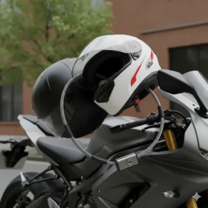 A flexible, anti-theft cable-style motorcycle helmet lock for securing multiple helmets.