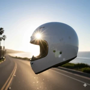 A light-colored motorcycle helmet reflecting the sun, demonstrating how to choose a light color to keep the helmet cool in summer.