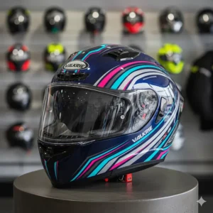 Close-up of a stylish graphic design on a womens motorcycle helmet, highlighting ventilation and visor quality.