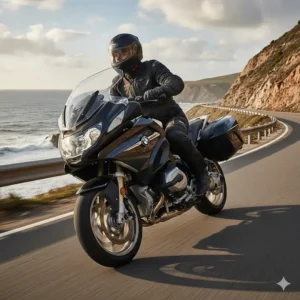 A rider wearing abrasion-resistant armored motorcycle pants while leaning into a curve on a touring bike.