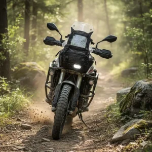 An adventure touring bike equipped with a rugged motorcycle handlebar bag on an off-road trail.