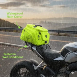 A motorcycle tail bag with a bright yellow waterproof rain cover being tested in wet conditions.