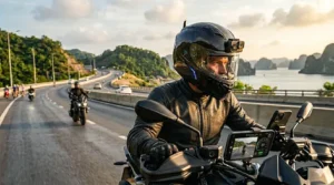 Close-up illustration of ultra-slim premium speakers built into a connected motorcycle helmet.