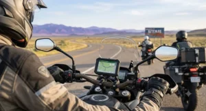 Rider wearing ergonomic touring gloves on a long-distance cross-country motorcycle trip for all-day comfort.