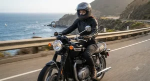 Female rider cruising on a street bike wearing protective women's armored motorcycle pants