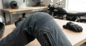 Detailed view of flexible stretch expansion panels above the knee on women's armored riding pants
