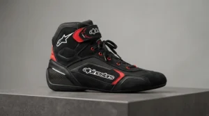 Studio side profile shot of lightweight budget racing boots for amateur racers highlighting ankle support