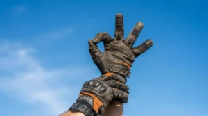 Rider demonstrating flexibility wearing lightweight mesh motorcycle gloves for hot weather riding