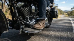 Feet resting on floorboards demonstrating cruiser riding posture in tall women's motorcycle boots for cruiser riders.